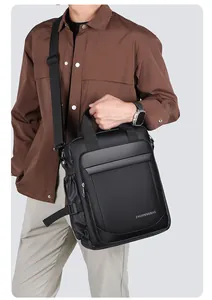 Macro detail of waterproof black business briefcase with reinforced handles and textures