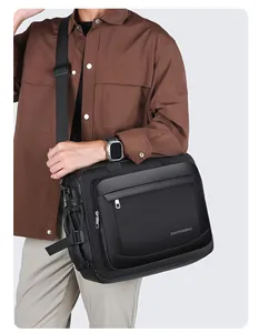Detail of waterproof black business messenger bag with adjustable strap and zip pockets