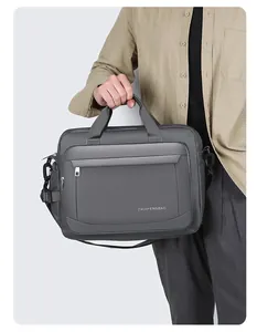 Detail of grey waterproof business laptop bag with reinforced handle and front zipper