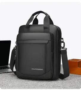 Close-up of black waterproof business laptop bag with reinforced handles and brand logo