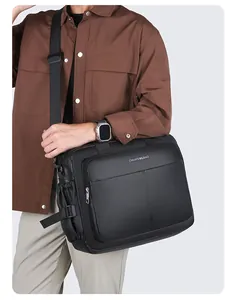 Close-up of black leather business briefcase with adjustable strap shown on model