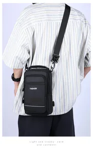 Men's black crossbody bag featuring a reflective strip and multi-zippered compartments