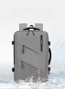 Detailed view of waterproof grey business backpack showing rain resistance and sleek texture
