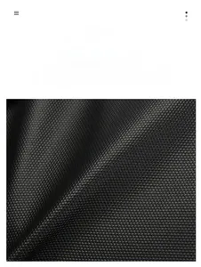 Detailed close-up of scratch-resistant and waterproof honeycomb fabric for laptop bags
