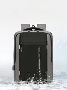 Waterproof business laptop backpack with USB port showing water-resistant fabric details