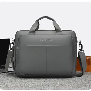 Detailed view of grey waterproof nylon business briefcase with adjustable strap