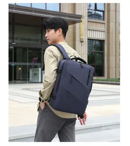 Detail of navy blue business backpack featuring parallel diagonal zippers and side buckles