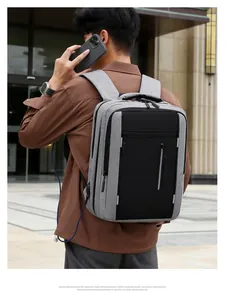Close-up of the grey-black travel backpack with external USB charging port feature