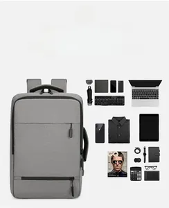 Detailed view of grey business backpack showing large capacity for laptops and gear