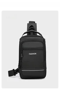 Close-up of black waterproof nylon crossbody bag with fashion logo and reflective strip