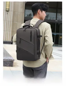Detailed view of dark grey business backpack with multiple pockets and ergonomic straps