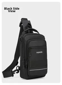 Detail of black crossbody chest bag with adjustable strap and front reflective strip