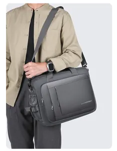 Side view of dark gray waterproof nylon business briefcase with adjustable strap