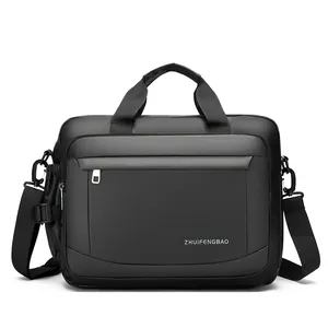 Business laptop bag in black waterproof fabric with top handles and shoulder strap