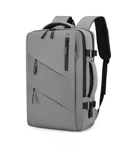 Side view of gray business backpack showing ergonomic straps and breathable mesh padding