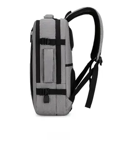 Side view of grey business backpack featuring USB charging port and reinforced buckles