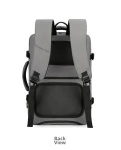 Back view of grey travel backpack showing ergonomic straps and luggage handle strap