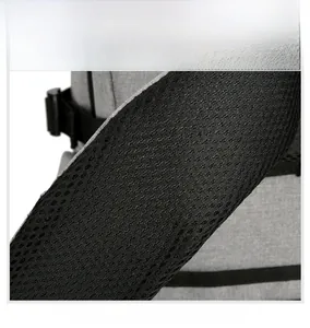 Detail of thickened breathable mesh shoulder straps on a durable grey business backpack