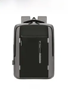 Front view of professional grey business backpack with waterproof panels and USB port