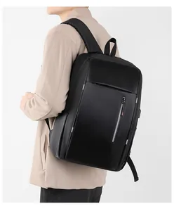 Close-up of a black business laptop backpack with waterproof fabric and reflective strips