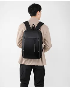 Detailed view of black business laptop backpack with external USB port on ergonomic back