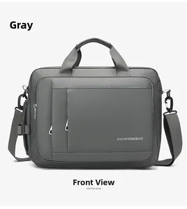 Front detail of gray laptop bag showing multi-compartment zipper design and strap