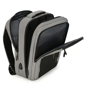 Gray business travel backpack with large capacity compartments and USB charging port