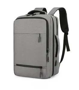 Detail of dark grey business backpack showing side handle and external USB charging port