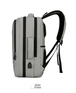 Side view of gray business backpack with USB charging port and reinforced handle