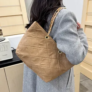 Brown quilted tote bag with gold chain strap for women, stylish large shoulder bag