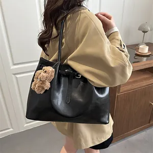 Black leather tote bag for women with large capacity and cute brown bear charm