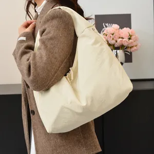 2025 casual hobo shoulder bag for women with large capacity and minimalist off-white nylon finish
