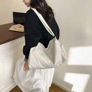 Cream-white lightweight nylon yoga bag with wide strap for gym and short travel