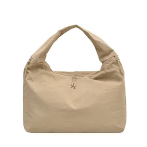 Large khaki nylon tote bag with dual zipper design and casual style for daily commute