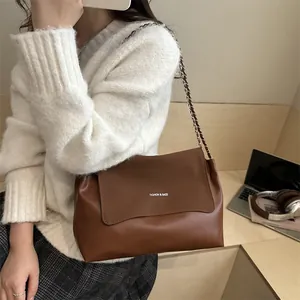 Brown vintage leather tote bag with chain strap and 'FASHION & BAGS' text for women