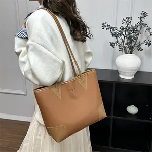 Brown lychee leather tote bag with long shoulder strap and large capacity in casual style