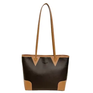 Brown leather tote bag for women with dual-tone finish and fashion shoulder straps