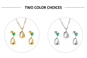 Close-up of irregular gold and silver necklace sets with green heart gemstones