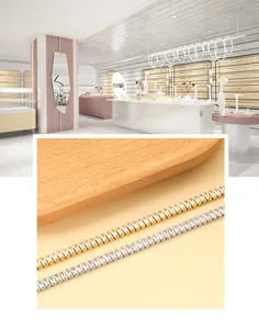 Detalle de pulseras tennis en oro de 18k y plata con circonitas baguette en tienda