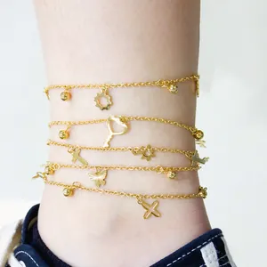 Schicke 18k Gold-Fußkettchen Set mit Stern, Schmetterling und Kreuz Anhängern für Strand