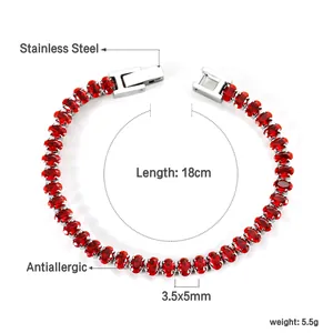 Detalle de pulsera tenis de gemas ovaladas rojas en acero inoxidable hipoalergénico