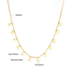 Detail showing gold plated stainless steel chain with multiple small feet shaped pendants