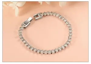 Close-up of silver-tone tennis bracelet with oval cubic zirconia in 4-prong setting
