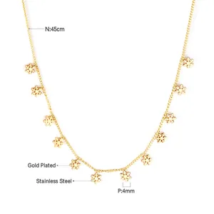 Detail of gold plated stainless steel necklace with 4mm snowflake pendants and 45cm chain