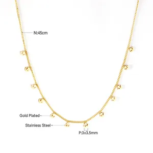 Close-up of gold-plated stainless steel necklace with small 3x3.5mm anchor pendants