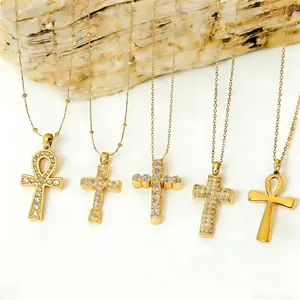 Set of five gold-plated Ankh and cross necklaces with sparkling zircon inlay details
