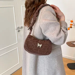 French leopard print shoulder bag with bow buckle and ruffled strap croissant shape