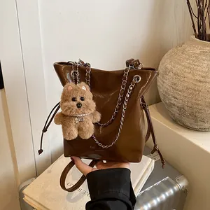 Women's Glossy PU Leather Bucket Bag With Metal Chain And Plush Bear Keychain Fashion Shoulder Crossbody Handbag Commuter Bag