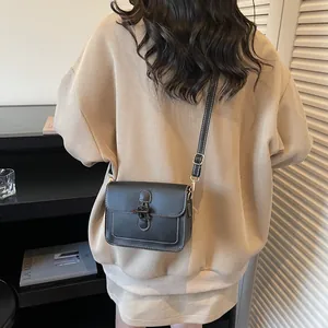 Retro black PU leather crossbody square bag with white stitching and metal buckle