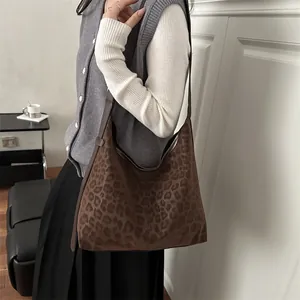 Retro leopard print hobo bag with large capacity and brown leather shoulder strap